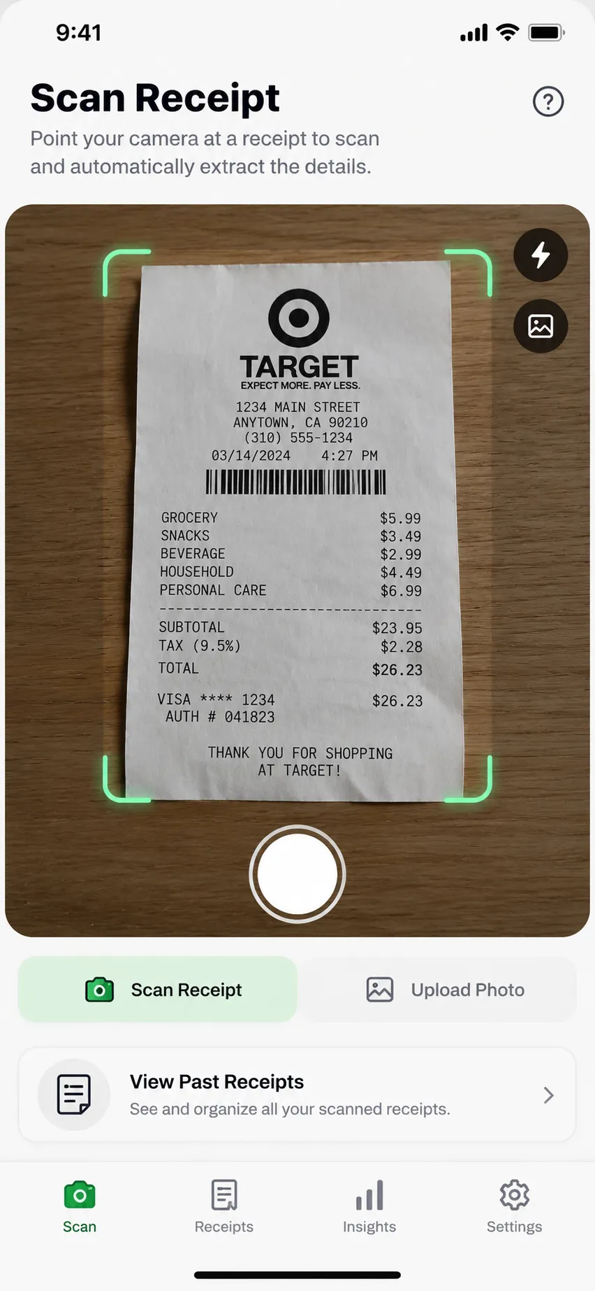 Receipt Scanner on a phone: the camera is pointed at a paper receipt and the app is ready to read its details.